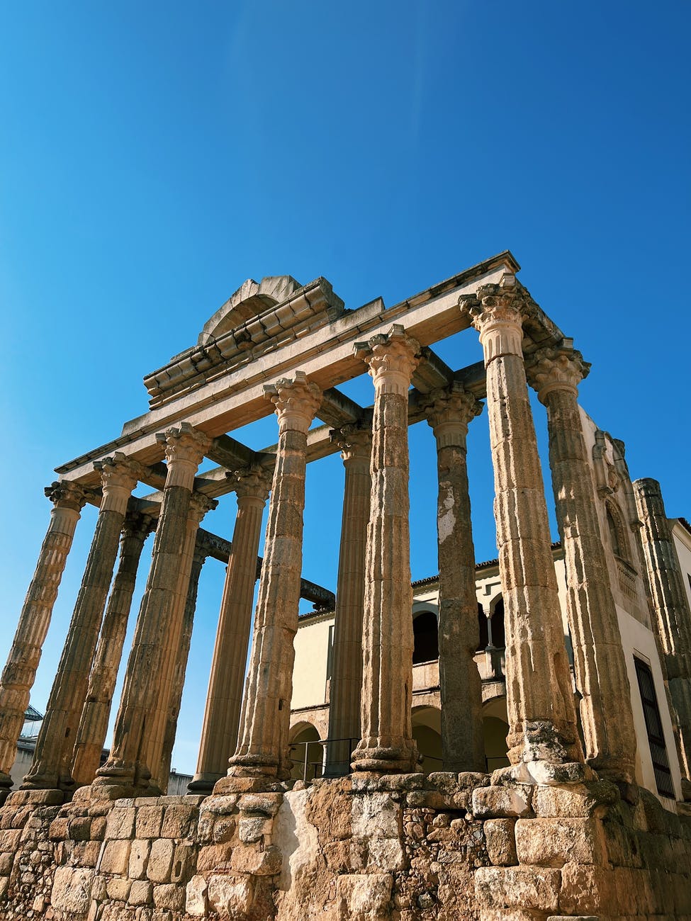 brown concrete building under blue sky